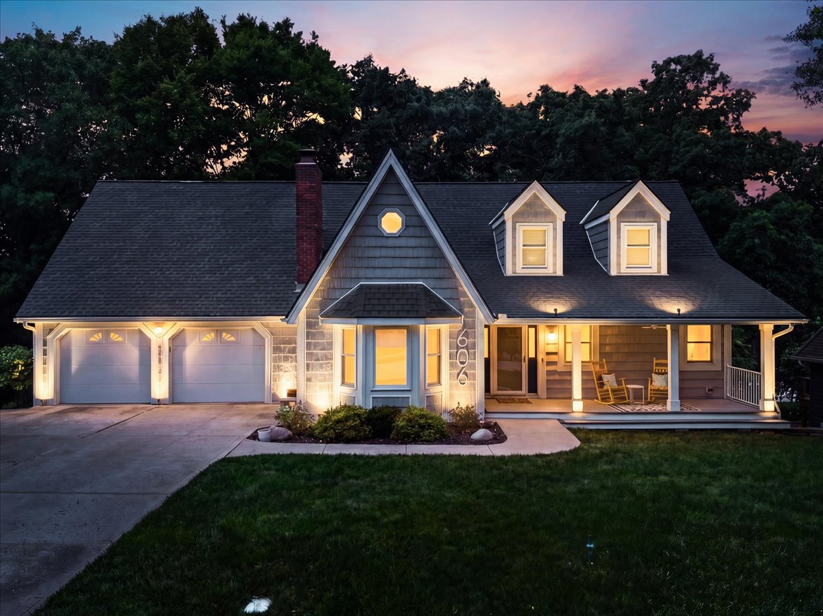 Exterior of 606 Camelot Drive, Lake Forest at twilight